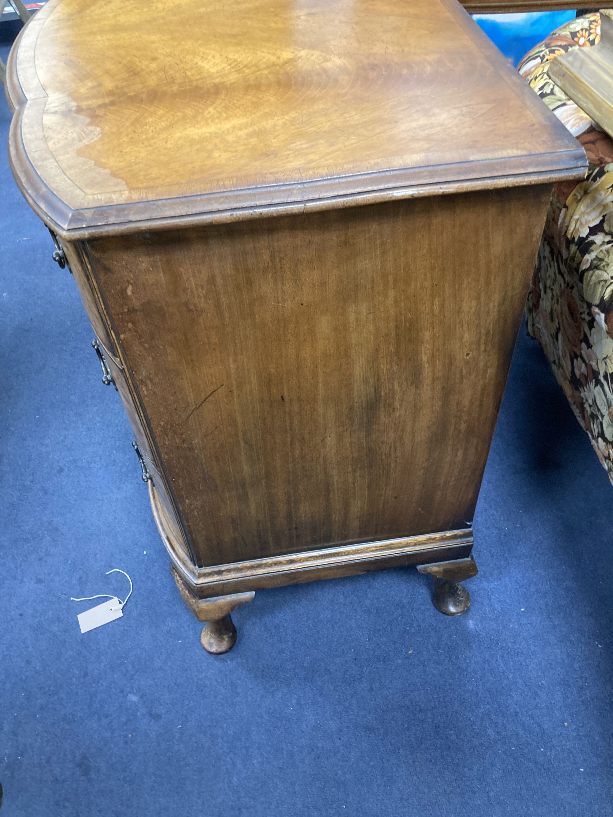 A Queen Anne revival walnut bow front three drawer chest, width 76cm, depth 50cm, height 77cm